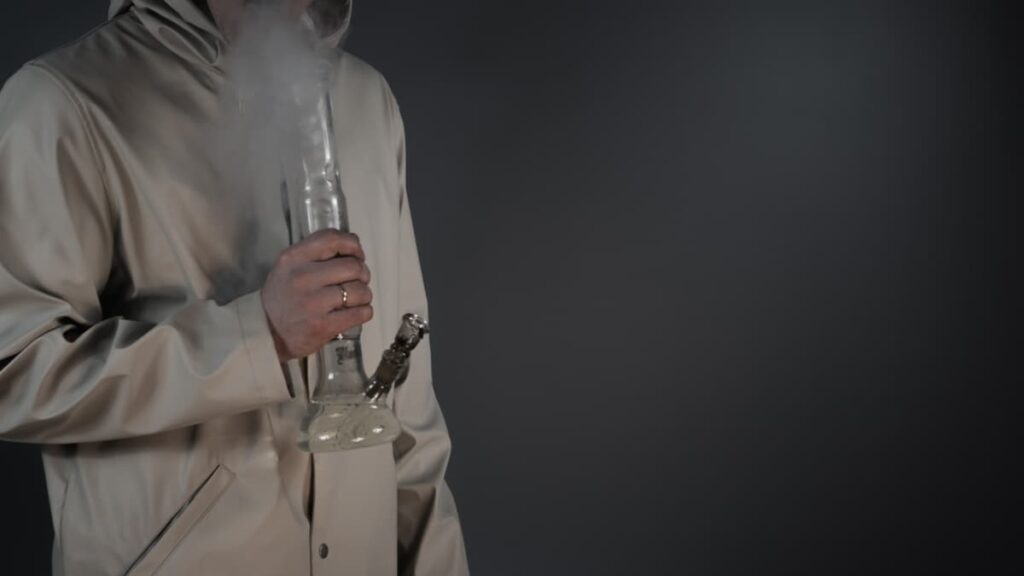 man smoking a bong